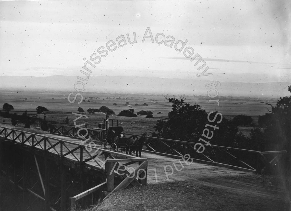 Horse-drawn carriage on bridge on Alum Rock Road