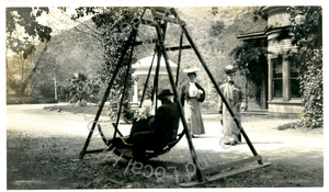 Man on swing and two women, Alum Rock Park