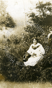 Image of Tomy sitting in a picnic spot