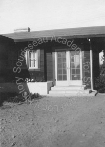 Image of A. G. Ochsner residence, view of French doors and steps leading to backyard