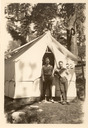 Image of Clark B. Waterhouse and colleague in front of a tent in the forest
