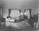Image of Bedroom with a double bed, McMahon house
