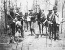 Image of Andrew P. Hill, Jr. and friends in Little Basin after a forest fire