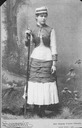 Image of Portrait of an unidentified young woman in hunting dress with a bayonetted rifle