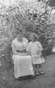 Image of Ruth and Birdella Hill in the garden at 1350 Sherman St. in San Jose